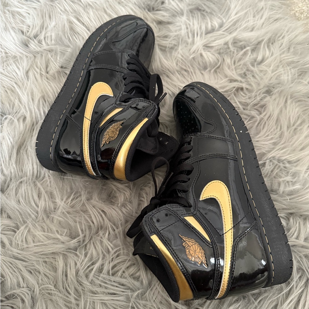 Kids Black and Gold Jordan High-Top Sneakers size 7 Youth